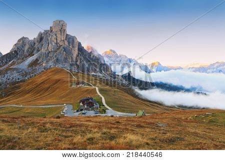 Dolomites mountains the Passo di Giau Monte Gusela at behind Nuvolau gruppe at sunset in South Tyrol Italy