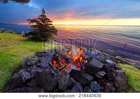Sunset fire along the beautiful beach of Lake Superior in northern Michigan