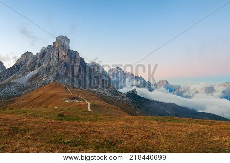 Dolomites mountains the Passo di Giau Monte Gusela at behind Nuvolau gruppe at sunset in South Tyrol Italy