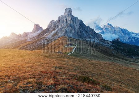Dolomites mountains the Passo di Giau Monte Gusela at behind Nuvolau gruppe at sunset in South Tyrol Italy