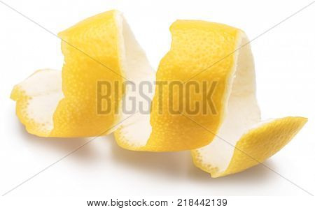 Lemon peel or lemon twist on white background. Close-up.