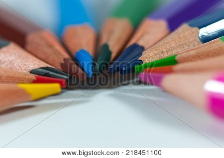A lot of colored pencil close up, teamwork conceptual image.