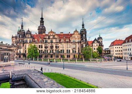 Residence of electors and kings of Saxony in Dresden. Sunny view of Castle or Royal Palace (Dresdner ResidenzschlossDresdner Schloss) from Zwinger museum. Artistic style post processed photo.