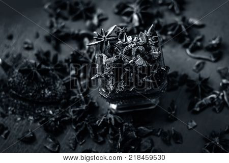 Close Up Star Aniseed,illicium Verum In A Bowl With Powder.