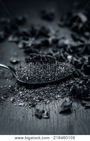 Close Up Star Aniseed,illicium Verum Powder In A Antique Spoon.