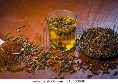 Close Up Of Clove,syzygium Aromaticum With Its Tea In A Transparent Cup.