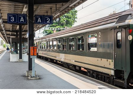 Locarno Switzerland - May 28 2016: A passenger train of the Swiss Federal Railways at a platform of the Locarno railway station. Swiss Federal Railways is the national railway company of Switzerland
