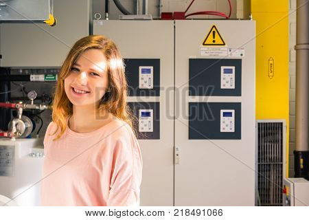 Young Female Engineer Printing Specialist Measuring Checking Colors Quality Booth Color Management I