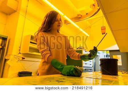 Young Female Engineer Printing Specialist Measuring Checking Colors Quality Booth Color Management I