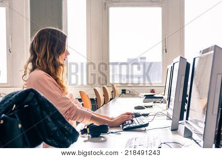 Young Female Engineer Printing Specialist Measuring Checking Colors Quality Booth Color Management I