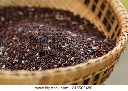 Coarse Rice Or Half Polished Rice Background Uncooked Raw Cereals In Bamboo Wicker Basket (shallow D