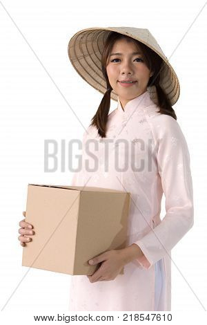 beautiful woman in pink dress and vietnam hat holding box. isolated background with clipping path.