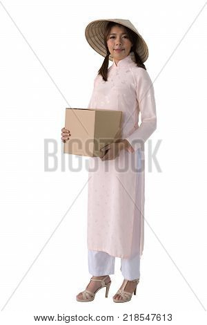 beautiful woman in pink dress and vietnam hat holding box. isolated background with clipping path.