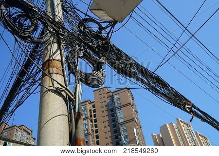 Electrical cable wire on the pole in mess