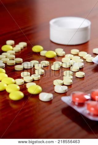 Pills on the Table at the Home closeup