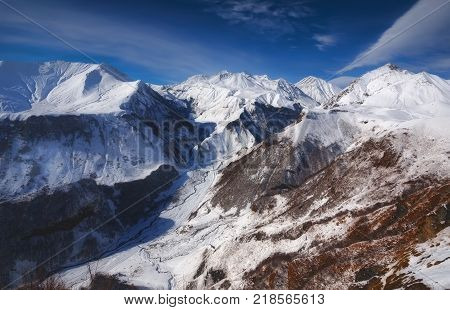 View of Caucasian Mountain in winter. Cross Pass in Georgia. Gudauri District.