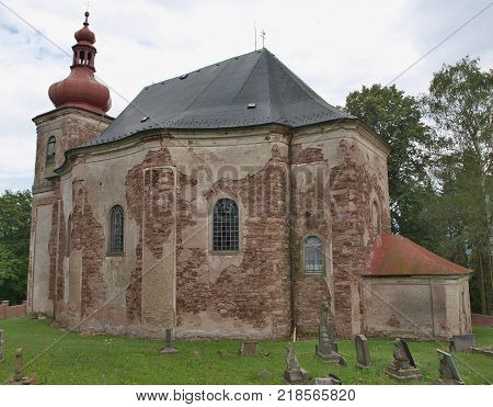 The Church of All Saints is a Roman Catholic church in Hermankovice. It belongs to the Broumov group of Baroque churches. It is protected as a cultural monument of the Czech Republic.