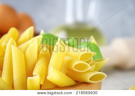 Penne rigate. Macaroni in the form of feathers. mostaccioli pasta