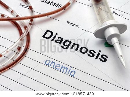 Diagnostic form, Anemia, drip irrigation equipment with traces of blood in a hospital, conceptual image