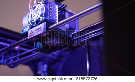 Close-up Of 3d Printer Working. Head Of 3d Printer In Action. 3d Printer Is A New Generation Of Tech