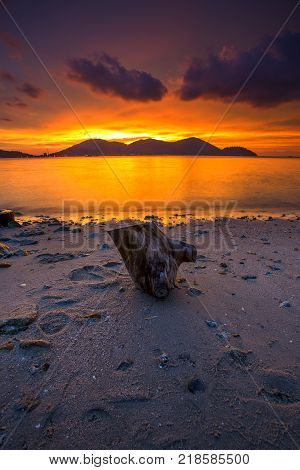 Beautiful view of sunset at Lumut,Perak,Malaysia. soft focus, blur due to long exposure. Visible noise due to high ISO.