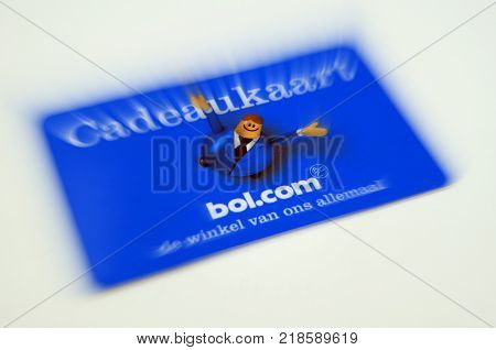 Amsterdam, The Netherlands-  December 17, 2017: Blue Bol.com giftcard. The card is a prepaid money card. Bol is the leading webshop in the Netherlands.