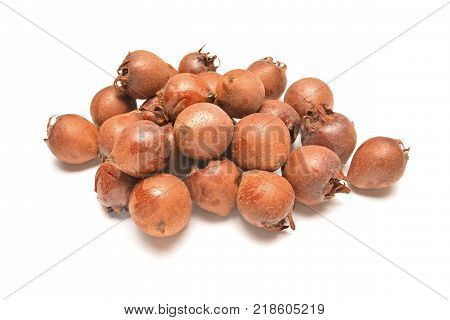 medlar fruits isolated on a white background