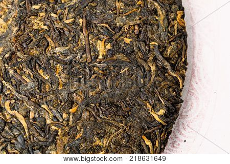 Old Shu Puerh Chinese fermented black tea, top view, macro photo