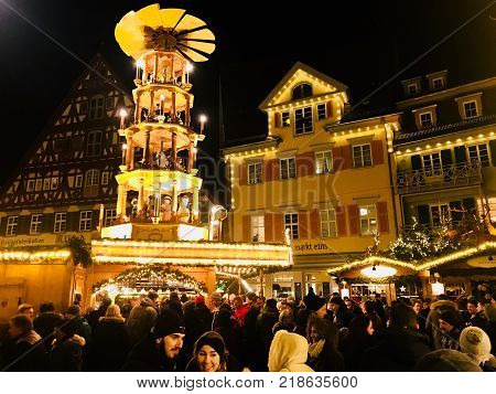 Esslingen, Germany - December 01, 2017: People enjoy the beautiful medieval Christmas Market at night in Esslingen, Germany.
