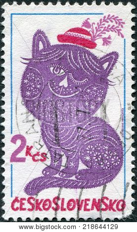 CZECHOSLOVAKIA - CIRCA 1980: A stamp printed in the Czechoslovakia, shown Folktale character embroideries, Dandy and Posy, circa 1980