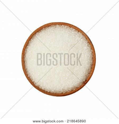 Close up one wooden bowl full of white sugar isolated on white background elevated top view directly above