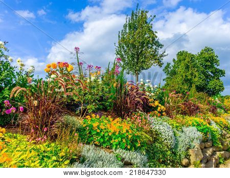 Rockery in St-Fraimbault a Normandy village in the Orne countryside in summer