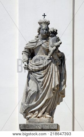 CAKOVEC, CROATIA - JULY 02: Virgin Mary with Child Jesus on the Parish Church of Saint Nicholas in Cakovec, Croatia, on July 02, 2016.