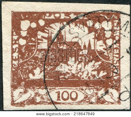 CZECHOSLOVAKIA - CIRCA 1919: A stamp printed in the Czechoslovakia, shown Hradchany (St. Vitus Cathedral) and St. Nicholas Church, Prague, circa 1919