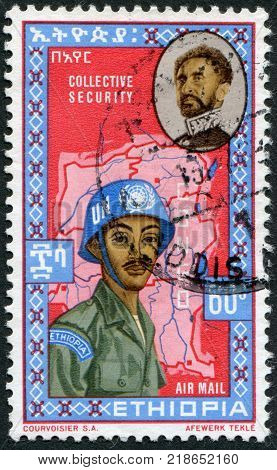 ETHIOPIA - CIRCA 1962: A stamp printed in the Ethiopia, is dedicated to the 70th anniversary of King Haile Selassie I. UN soldiers on a map of the Congo, circa 1962