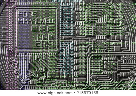 Image of the program code showing the process of mining the crypto currency in the background of the image with bitcoin