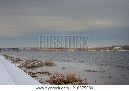 View of the Dnieper in winter. Kiev, Ukraine. Paton bridge