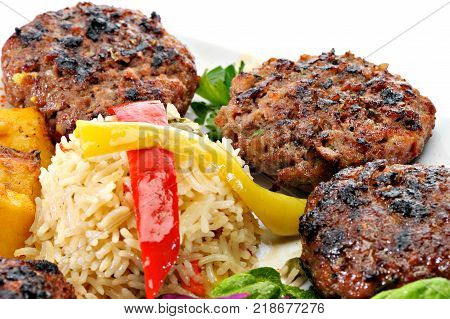 Greek Burger Plate	with rice and fried potatoes