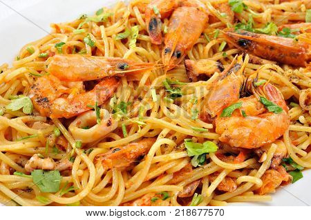 Pastas with shrimps squids and tomato sauce