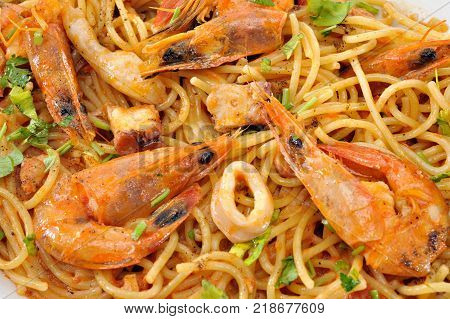 Pastas with shrimps squids and tomato sauce