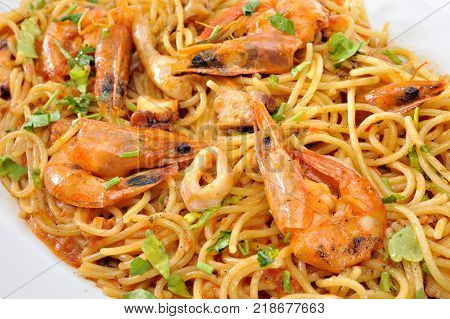 Pastas with shrimps squids and tomato sauce