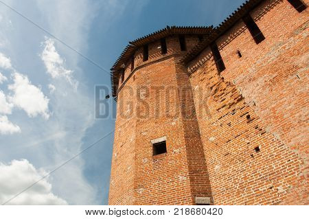 Faceted Tower Of Kremlin On Blue Sky Background Sunny Summer Day Close Up And Bottom View. Kolomna Moscow Region.