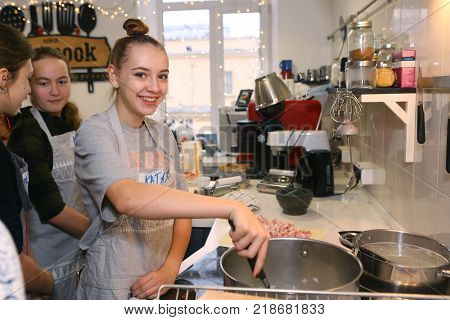 Teen Kids Cooking On Big Kitchen Background