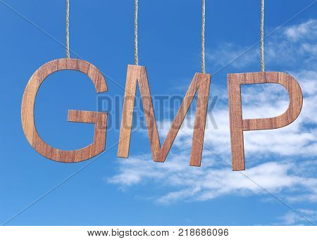 Wooden GMP text Stands for Good Manufacturing Practice hanging on rope on blue sky background.