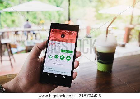 Chiangmai Thailand -nov 132017:man Hand Holding Screen Shot Of Gmail App Showing On Sony Experia Xzs