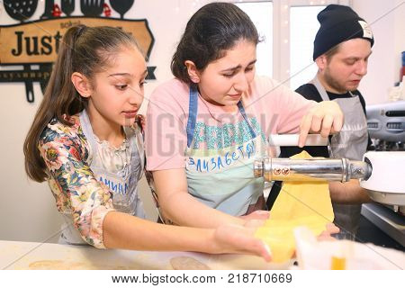 Teen Kids Cooking On Big Kitchen Background