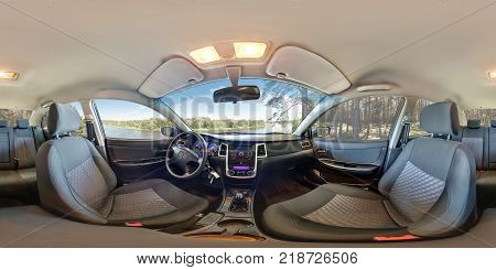 SMORGON BELARUS - MAY 3 2014: Full 360 equirectangular spherical panorama in the interior of prestige modern car geely emgrand cs7 in summer forest