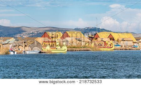 Titicaca Peru - September 2017: Traditional reed boat as transportation for tourists Islas es los Uros Lake Titicaca Peru
