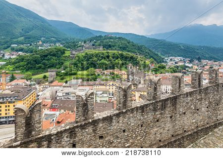 Bellinzona Switzerland - May 28 2016: Montebello Castle and surrounding cityscpae view from Castelgrande castle in cloudy weather in Bellinzona Switzerland.