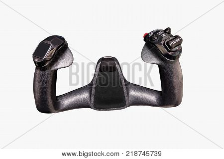 Inside the cockpit of the snall airplane. The steering wheel of the aircraft. Close up steering wheel on white background